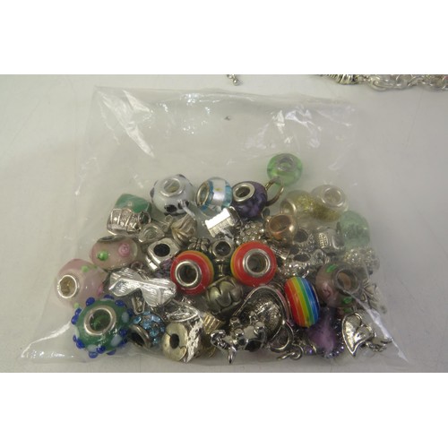 133 - Seventeen pandora style charm bracelets and charms