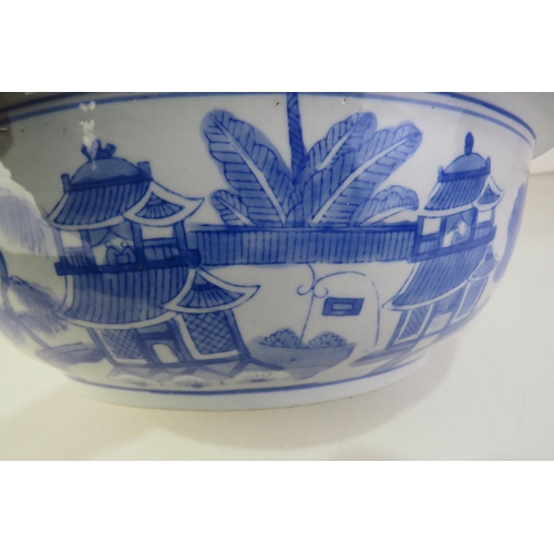 177 - A chinese blue and white large porcelain bowl painted with houses and pergolas outer and inner with ... 