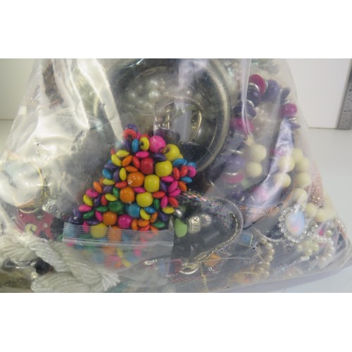 97 - 10kg bag of costume Jewellery.