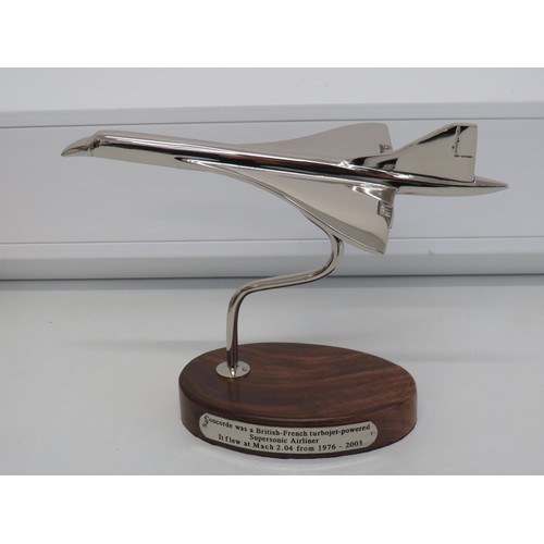 147 - Chrome Concorde on wooden base