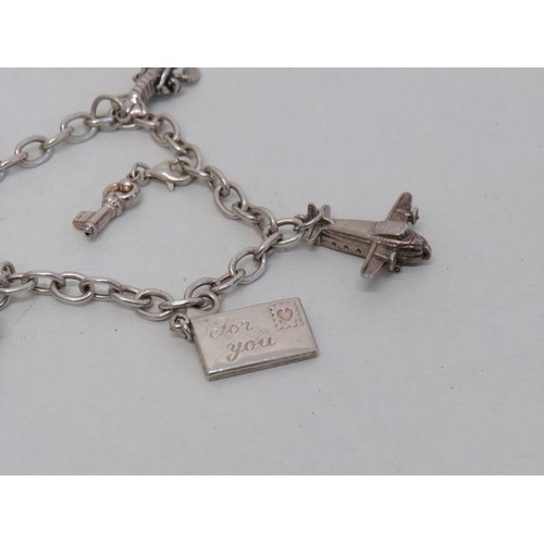 171 - Silver Charm Bracelet with Seven Charms