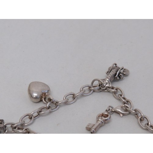 171 - Silver Charm Bracelet with Seven Charms