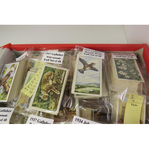 26 - Red folder with 1930's cigarette cards and box of cigarette boxes