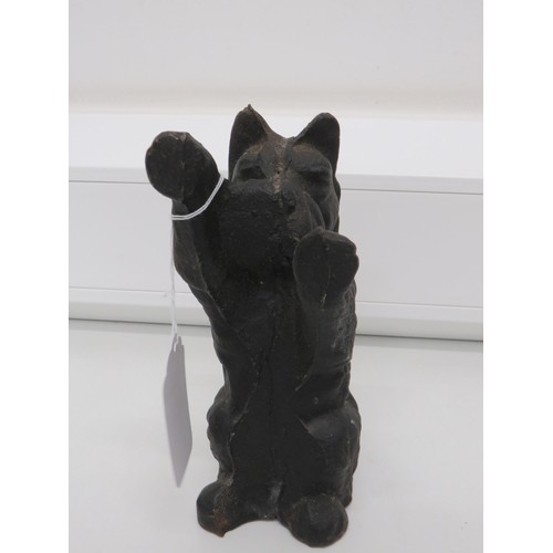 92 - Vintage cast iron Scottie dog door stop.