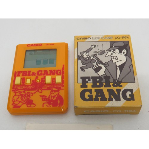 96 - Vintage 1987 Casio LCD Game FBI & Gang CG-119A, with original box and instructions.