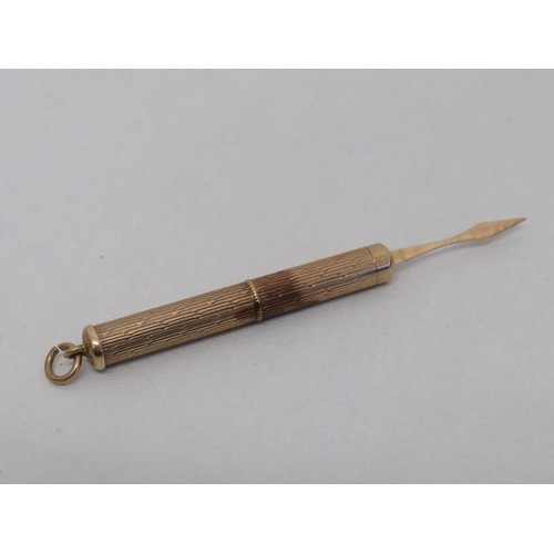 37 - Revolving toothpick 9ct gold- 6.2g