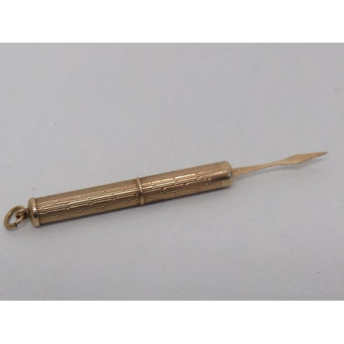 37 - Revolving toothpick 9ct gold- 6.2g