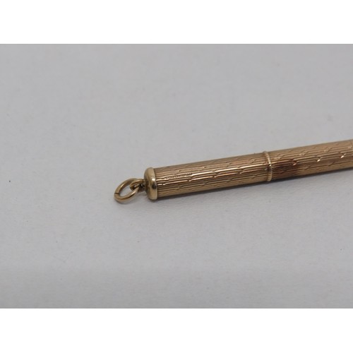 37 - Revolving toothpick 9ct gold- 6.2g