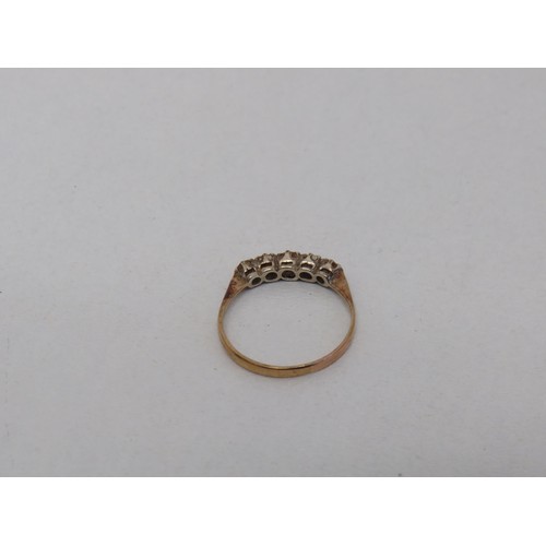 39 - 9ct Gold ring with five stone setting 1.6g