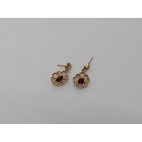 40 - Pair of 9ct gold earrings with red stones- 1.4g