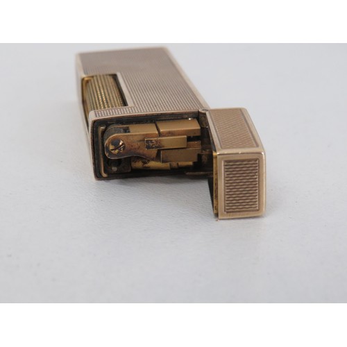 60A - Dunhill 9ct gold lighter in good working condition