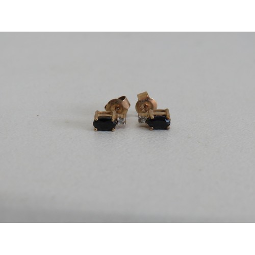 72 - 9ct Gold Sapphire and Diamond stud earrings with box. Weight 0.9g