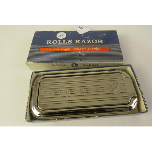 106 - Boxed rolls razor