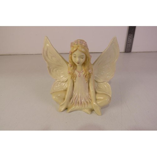 131 - Signed hand painted angel figure sitting