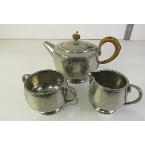 31 - Tudric (for liberty) planished pewter- three piece tea service