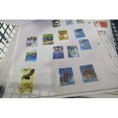 137 - One hundred sheets of world stamps