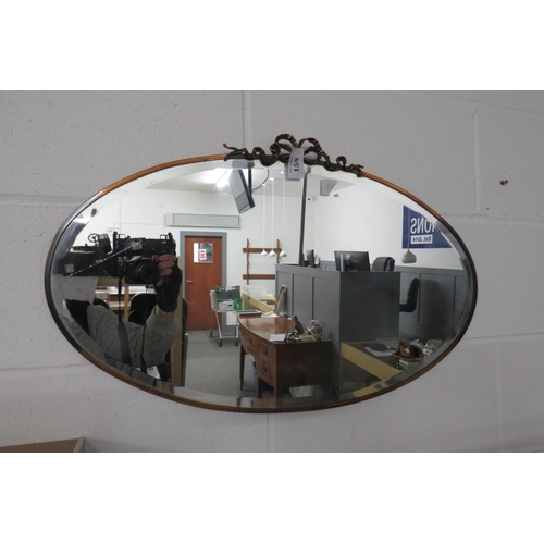 158 - Antique oval copper framed mirror