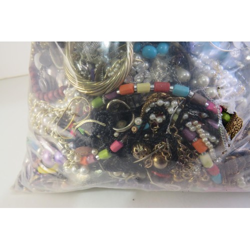 98 - 10kg bag of costume Jewellery.