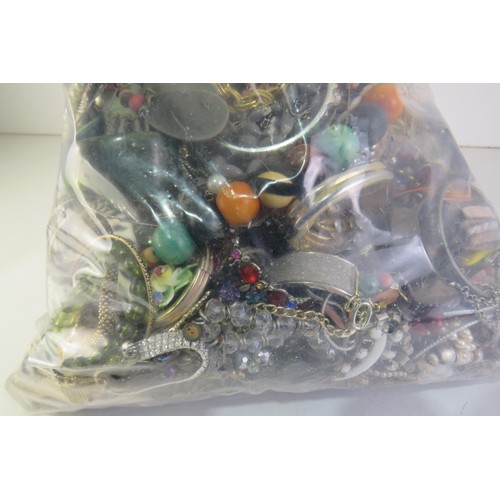 98 - 10kg bag of costume Jewellery.