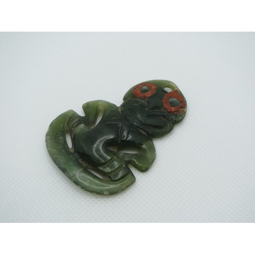 71 - Early 19th Century Maori carved Nephrite Hei -Tiki Pendant with red wax eyes.
Height 5.5cms x with 4... 