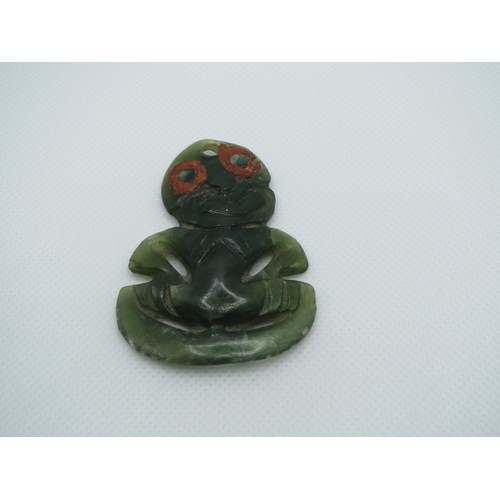 71 - Early 19th Century Maori carved Nephrite Hei -Tiki Pendant with red wax eyes.
Height 5.5cms x with 4... 