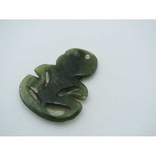 71 - Early 19th Century Maori carved Nephrite Hei -Tiki Pendant with red wax eyes.
Height 5.5cms x with 4... 