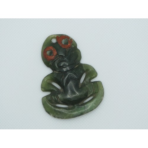 71 - Early 19th Century Maori carved Nephrite Hei -Tiki Pendant with red wax eyes.
Height 5.5cms x with 4... 