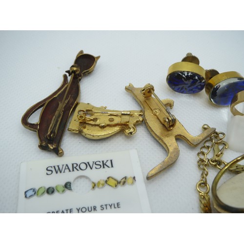 69 - Jewellery to include Australian Opal brooches, opalite, Swarovski scarab beetle etc.