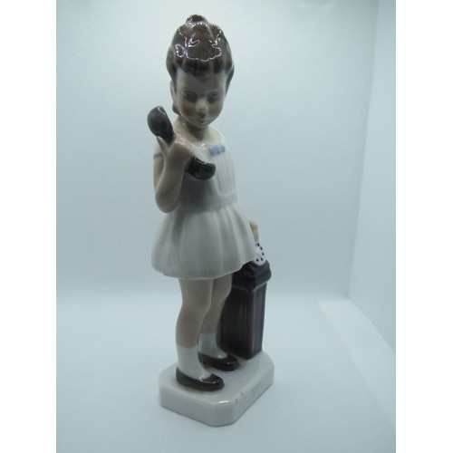 66 - Denmark Royal Copenhagen hand painted porcelain figurine of girl with telephone.
Height 17.5cms.