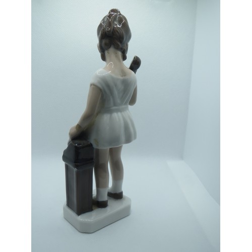 66 - Denmark Royal Copenhagen hand painted porcelain figurine of girl with telephone.
Height 17.5cms.