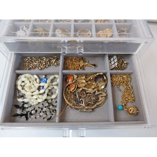 61 - Five drawer Jewellery storage cabinet full of jewellery.