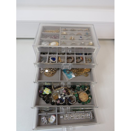 62 - Five drawer Jewellery storage cabinet full of jewellery.