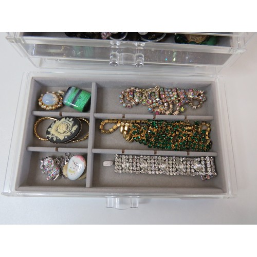 62 - Five drawer Jewellery storage cabinet full of jewellery.