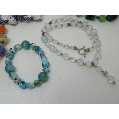 70 - Vintage glass and porcelain necklaces and bracelet.