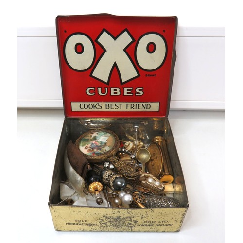 43 - Vintage Oxo tin full of ladies vanity collectables, hat pins, lipstick mirror compact, handheld mirr... 