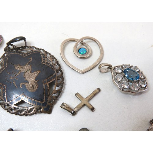 47 - Job lot of assorted silver pendants include Cameo, Gemstone, lockets etc.
Weight 118g.