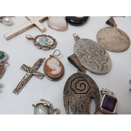 47 - Job lot of assorted silver pendants include Cameo, Gemstone, lockets etc.
Weight 118g.