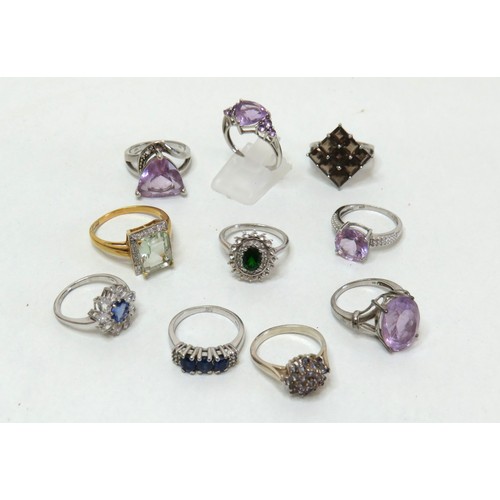 52 - Ten 925 silver rings set with gemstones, CZ and crystal.
38.5g