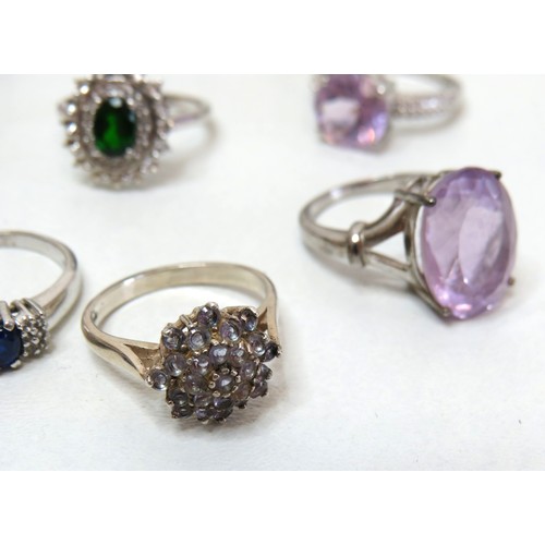 52 - Ten 925 silver rings set with gemstones, CZ and crystal.
38.5g