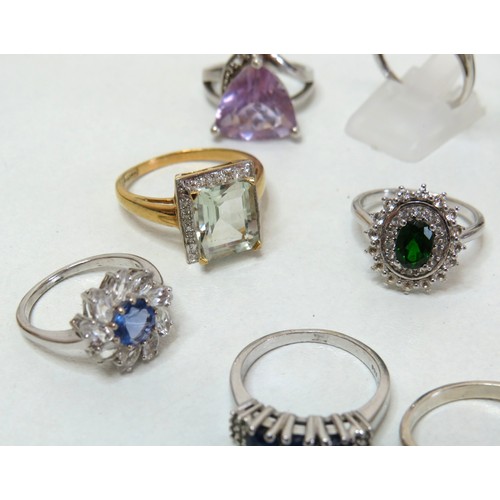 52 - Ten 925 silver rings set with gemstones, CZ and crystal.
38.5g