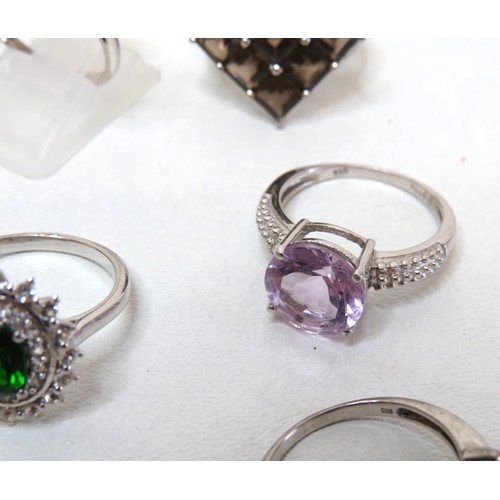 52 - Ten 925 silver rings set with gemstones, CZ and crystal.
38.5g