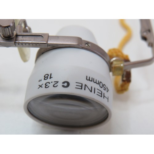 54 - A pair of Heine Dental & Surgical magnifying Loupes, C2.3 x 450mm