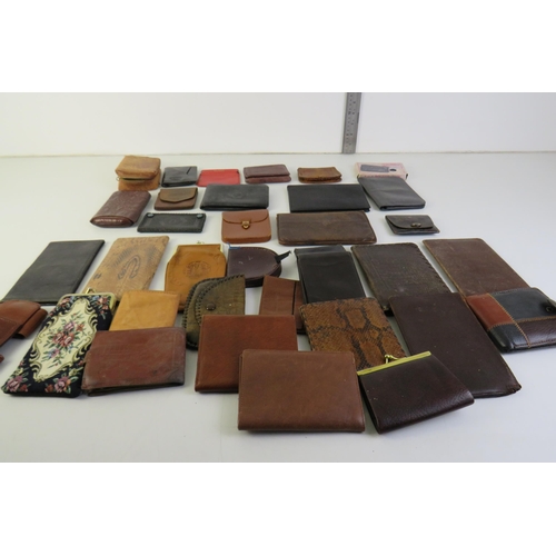 111 - Thirty-five vintage leather wallets