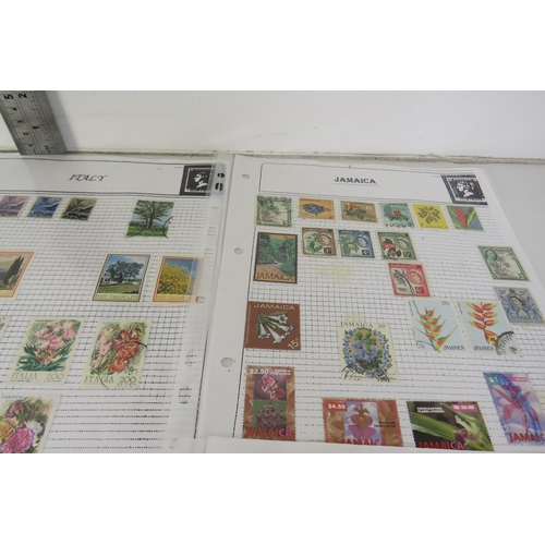 132 - One hundred sheets of world stamps flowers and animals