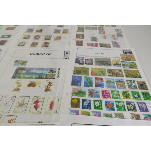 132 - One hundred sheets of world stamps flowers and animals