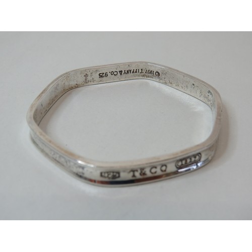 7 - 925 Silver Tiffany & Co bangle with box.
weight 28.5g.