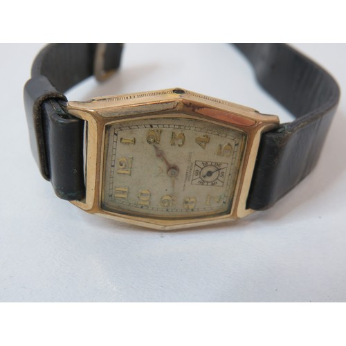 27 - Art Deco 9ct Gold cased wristwatch with leather strap a/f.