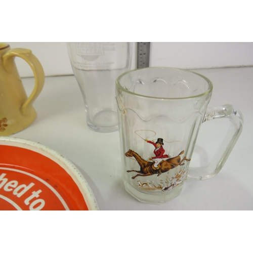 209 - Tetley collection including jug, three glasses, two ashtrays, tray and ceramic mug