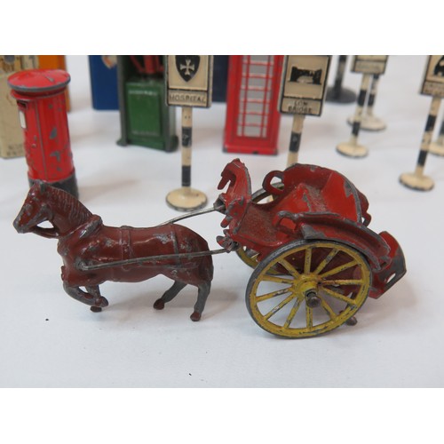 45 - Collection of vintage diecast Britains and Dinky toys includes horse & cart, petrol pumps, road sign... 