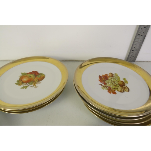 377 - Twenty pieces of fruit patterned plates with gold effect rim